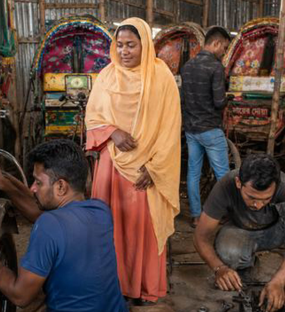 With rickshaw and makers in her garage